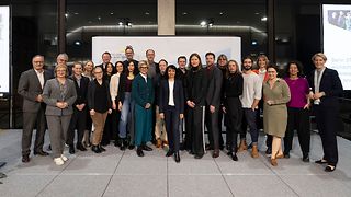 Gruppenbild mit Teilnehmenden