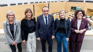 Gäste auf der Besuchertribüne